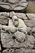 Candi Cetho - Sculptures of the eighth terrace. 